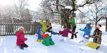 Familienhotel - Skilift - Winterspaß für die ganze Familie im Kinderhotel Gut Weissenhof in Radstadt im Salzburger Land - Hotel Gut Weissenhof ****S