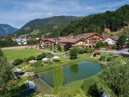 Familienhotel - Umgebungsschwerpunkt: Fluss - Thumersbach - Furtherwirt mit Bio-Badeteich - Familotel Landgut Furtherwirt