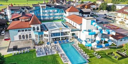 Familienhotel - Spielplatz - PLZ 5602 (Österreich) - Schlosshotel Lacknerhof mit Außenpool, Wasserrutsche und Schlossgarten - Schlosshotel Lacknerhof****S Flachau