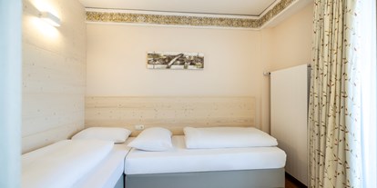 Familienhotel - Tennis - PLZ 8960 (Österreich) - Unsere neuen Familien-Crystal-Suiten mit dem Kinderzimmer - Schlosshotel Lacknerhof****S Flachau