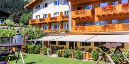 Familienhotel - Umgebungsschwerpunkt: See - PLZ 5550 (Österreich) - Garten und Terrasse - Familienhotel Botenwirt ***S