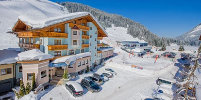 Familienhotel - Verpflegung: Halbpension - Straßerberg - Ski-Hotel Zauchensee Zentral direkt an der Piste und am Lift - Hotel Zauchensee Zentral
