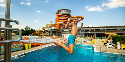 Familienhotel - Pools: Innenpool - Österreich - Sprungturm - Hotel Sonnenpark**** Superior