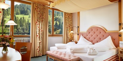 Familienhotel - Umgebungsschwerpunkt: am Land - PLZ 9762 (Österreich) - Himmelbett-Zimmer - Hotel DIE POST