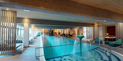 Familienhotel - Pools: Außenpool beheizt - PLZ 9074 (Österreich) - Hotel Die Post - Indoorpool in coolem Design - Hotel DIE POST