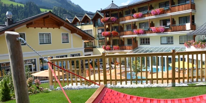 Familienhotel - Skikurs direkt beim Hotel - Straßerberg - Garten - Hotel Guggenberger