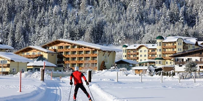 Familienhotel - Pools: Innenpool - Österreich - Einstieg in die Langlaufloipe direkt vorm Hotel - Hotel Seehof