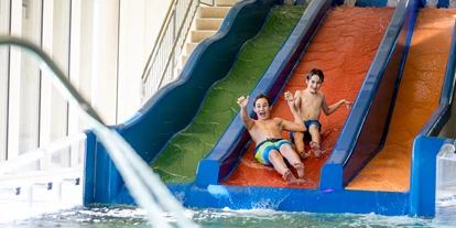 Familienhotel - Spielplatz - Wasserrutschen in der Wassererlebniswelt - Hotel Seehof