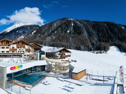 Familienhotel - Umgebungsschwerpunkt: Berg - Trentino-Südtirol - Winter Außenaufnahme - Familienhotel Huber