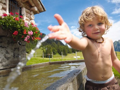 Familienhotel - Golf - Klosters - Professionelle Kinderbetreuung mit dem Fokus "Natur spielerisch entdecken"  - Familienhotel Lagant