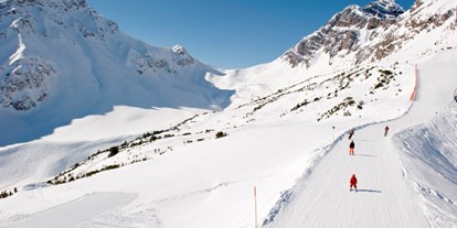 Familienhotel - Garten - PLZ 6787 (Österreich) - Erleben Sie traumhafte Skitage mit der ganzen Familie - Familienhotel Lagant