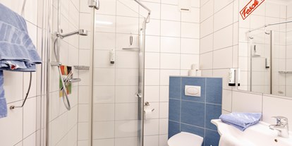 Familienhotel - Einzelzimmer mit Kinderbett - Großenegg (Diex, Griffen) - Badezimmer - ***Erlebnisgasthof Moasterhaus