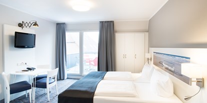 Familienhotel - Einzelzimmer mit Kinderbett - PLZ 26506 (Deutschland) - Familienappatement Typ B [unten] - Hotel Deichkrone - Familotel Nordsee