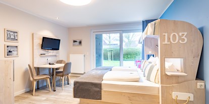 Familienhotel - Einzelzimmer mit Kinderbett - PLZ 26506 (Deutschland) - Hotel Deichkrone - Familotel Nordsee