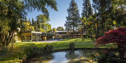 Familienhotel - Hallenbad - Fai della Paganella - Gartenanlage mit Teich - Du Lac et Du Parc Grand Resort