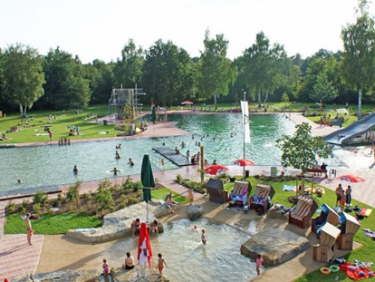 Familienhotel - Schwimmkurse im Hotel - Immenreuther Natur Erlebnisbad - Familotel Mein Krug