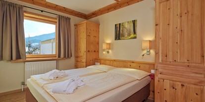 Familienhotel - Kinderbetreuung - PLZ 6281 (Österreich) - Schlafzimmer "Braunbär" - Das Hopfgarten Familotel Tirol