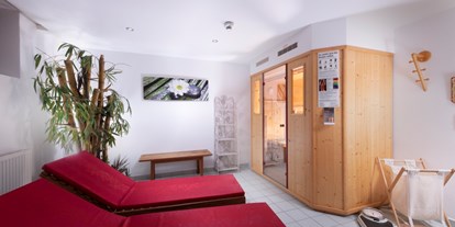 Familienhotel - Garten - PLZ 83735 (Deutschland) - Gegen Muskelkater - unsere Infrarot-Sauna - Familienhotel Central 