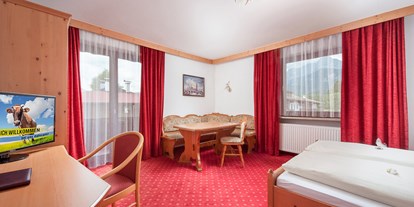 Familienhotel - Unkenberg - Straußennest - Elternzimmer - 2 Raum App. 2 Erw. bis zu 5 Kinder - Familienhotel Central 