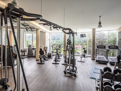 Familienhotel - PLZ 8983 (Österreich) - Panorama Fitness Studio mit Technogym Geräten - Dilly - Das Nationalpark Resort