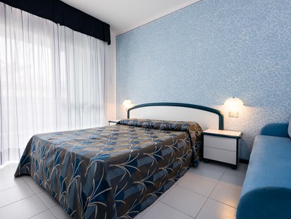 Familienhotel - Einzelzimmer mit Kinderbett - Italien - Imperial Aparthotel