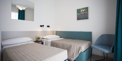 Familienhotel - Umgebungsschwerpunkt: Stadt - Peschiera del Garda - Kinderzimmer - SISAN Family Resort