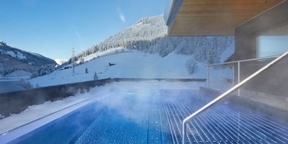 Familienhotel - Skikurs direkt beim Hotel - PLZ 9974 (Österreich) - Almhof Family Resort & SPA