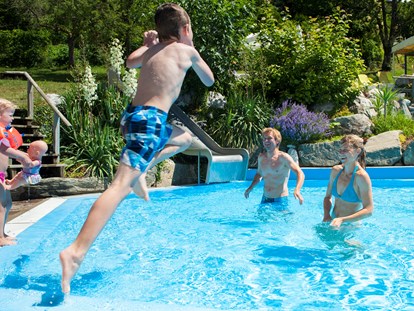 Familienhotel - Pools: Infinity Pool - Töbring - Familienhotel Post am Millstätter See - family.sport | see.berg