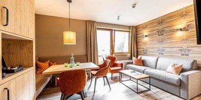 Familienhotel - Preisniveau: moderat - PLZ 6272 (Österreich) - Wohnzimmer Suite Spitzingsee - Das Bayrischzell Familotel Oberbayern