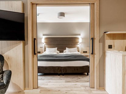 Familienhotel - Preisniveau: moderat - Kössen - Schlafzimmer 1 Suite Tegernsee - Das Bayrischzell Familotel Oberbayern