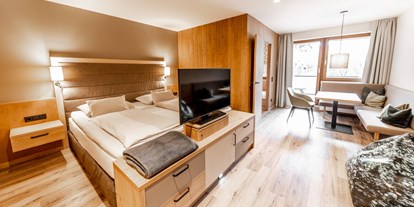 Familienhotel - Preisniveau: moderat - PLZ 6272 (Österreich) - Schlafzimmer Apartement Wendelstein - Das Bayrischzell Familotel Oberbayern