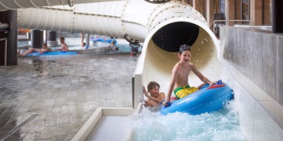 Familienhotel - Schwimmkurse im Hotel - Passeiertal - Wasserrutsche - Quellenhof Luxury Resort Passeier