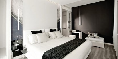Familienhotel - Rimini - GLAMOUR ZIMMER - Diese Zimmer sind unser ganzer Stolz und unsere Freude: schon beim Betreten versteht man ohne viel Worte, dass hier traditioneller Komfort auf Innovation trifft.  - Hotel Belvedere