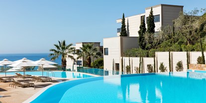 Familienhotel - Kinderbetreuung in Altersgruppen - Griechenland - Infinity Pool - Ikos Resort Oceania