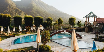 Familienhotel - Skilift - PLZ 8970 (Österreich) - großzügiger Naturgarten mit Pool - Verwöhnhotel Berghof