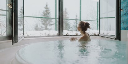 Familienhotel - Tennis - Wagrain - & nach dem Skifahren in unserem Wellnessbereich relaxen - Verwöhnhotel Berghof