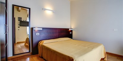 Familienhotel - Emilia Romagna - Zimmer mit Doppelbett - Europa Monetti LifeStyle & Family Hotel