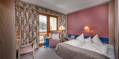 Familienhotel - Hallenbad - Lientsch - Zweites Schlafzimmer in der Familien-Luxussuite "Max & Moritz" - Hotel St. Oswald