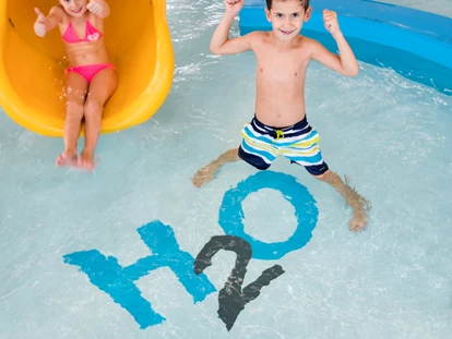 Familienhotel - Schwimmkurse im Hotel - Sulz im Burgenland - HopiHo Wasserspielgarten - H2O Hotel-Therme-Resort