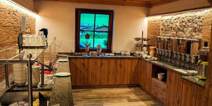 Familienhotel - Sauna - Tirol - Premium-Inklusivpension - abends mit feiner Gourmetküche und Kinderessen - Naturhotel Kitzspitz