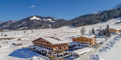 Familienhotel - Skikurs direkt beim Hotel - PLZ 6353 (Österreich) - Wnter direkt am Lift und Langlaufloipe - Naturhotel Kitzspitz