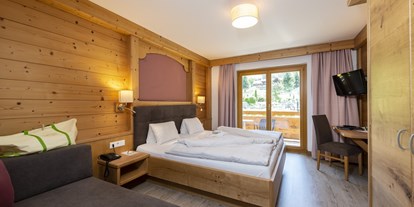 Familienhotel - Tennis - PLZ 6392 (Österreich) - Zimmer von klein bis Gross, für jeden Geschmack und alle mit Balkon - Naturhotel Kitzspitz
