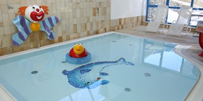 Familienhotel - Skikurs direkt beim Hotel - PLZ 5753 (Österreich) - Kleinkinder Pool - Wellness-& Familienhotel Egger