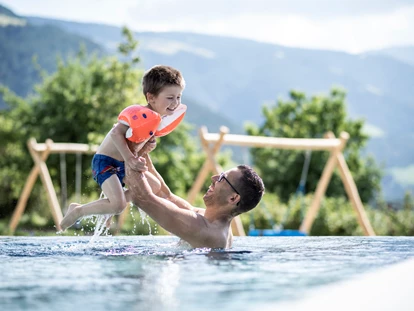 Familienhotel - Schwimmkurse im Hotel - Oberbozen - Ritten - Family Spa - Das Mühlwald - Quality Time Family Resort