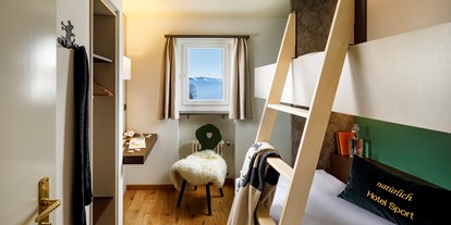 Familienhotel - Sauna - Graubünden - Familienzimmer Superior | Kinderschlafzimmer mit Hochbetten - Hotel Sport Klosters