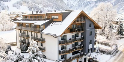 Familienhotel - Einzelzimmer mit Kinderbett - Kitzbühel - Kinderhotel Sonnblick Kaprun