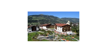Familienhotel - Ladestation Elektroauto - Kirchdorf in Tirol - Landhotel Schermer - Außenansicht - Landhotel Schermer