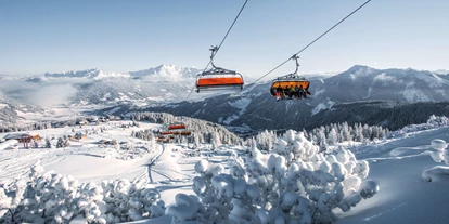 Familienhotel - Pools: Innenpool - Assach - Skigebiet - Alpines Lifestyle Hotel Tannenhof