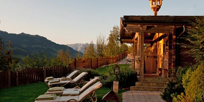 Familienhotel - Gartenanlage mit Aussensauna - Alpines Lifestyle Hotel Tannenhof