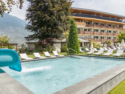Familienhotel - Umgebungsschwerpunkt: Berg - Trentino-Südtirol - Kinderpool mit Wasserrutsche - Hotel das Paradies